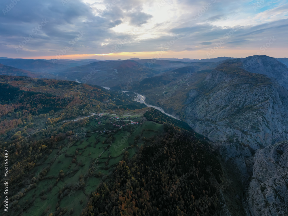 Aerial view of Valla Canyon, top view of geological touristic attraction and destination with a sightseening terrace and beautiful sky with clouds