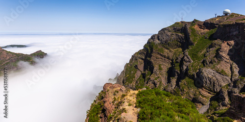 High up shot of Pico do Arieiro in Madeira with clouds