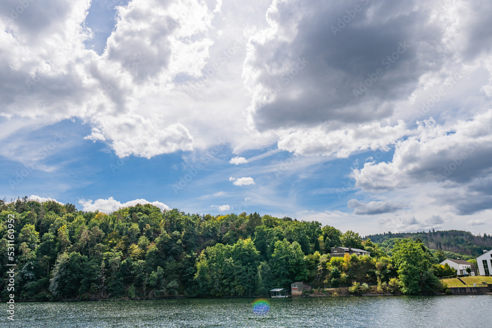Fototapeta premium Lake Rursee, In the middle of the Eifel National Park, surrounded by unique natural scenery and unspoilt nature