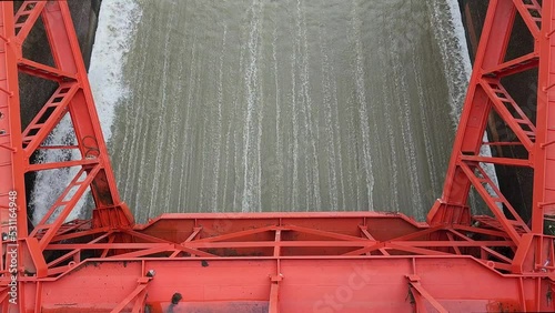 Water flowing over floodgate of a dam - Spillway of dam gate on daytime