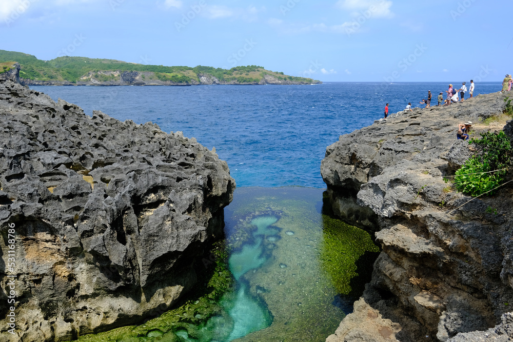 Indonesia Penida Island - Angel Billabong - natural pool framed rock cliffs