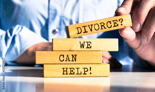 Business Man Pointing the Text: Divorce? We Can Help! photo