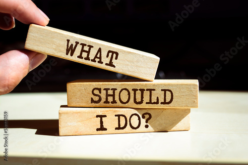 Foto Wooden blocks with words 'What should I Do?'.