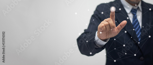 Businessman touching the connection point with his finger