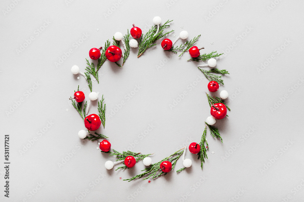 Round frame made of Christmas decorations with free space for text. Christmas wreath card