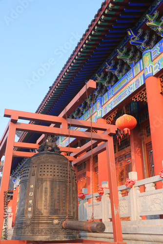 big copper bell in the temple photo