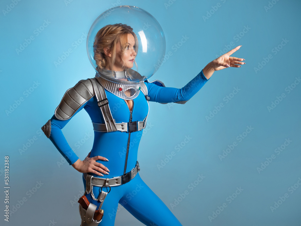 Fantastic astronaut costume in retrofuturism style. A young beautiful ...