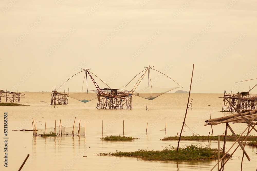 Fototapeta premium fishing boat at sunset