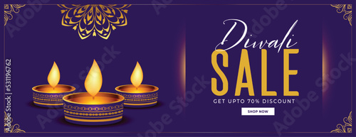 premium happy diwali sale banner with golden diya in purple background