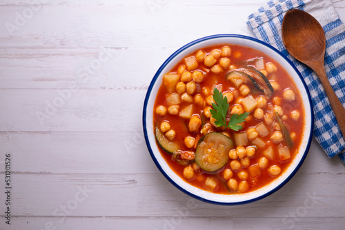 Chickpea stew with vegetables. Typical Spanish vegan recipe.