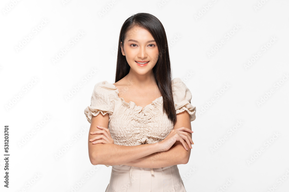 Attractive asian young woman smile and crossed arm isolated on white background happiness and successful. Cheerful pretty girl wear casual dress crossed arm looking at camera confident and smart Attractive asian young woman smile and crossed arm isolated on white background happiness and successful. Cheerful pretty girl wear casual dress crossed arm looking at camera confident and smart