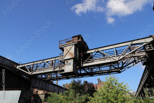 an old overhead crane on an abandoned industrial site