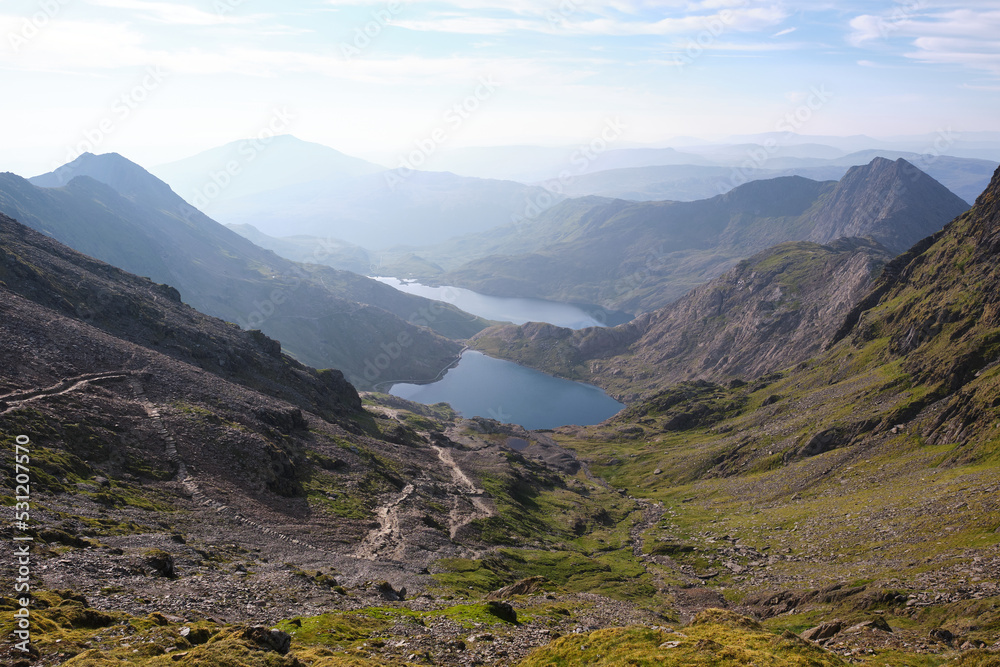 A photograph of Snowdon's valleys and lakes taken from the summit of Snowdon in June 2021