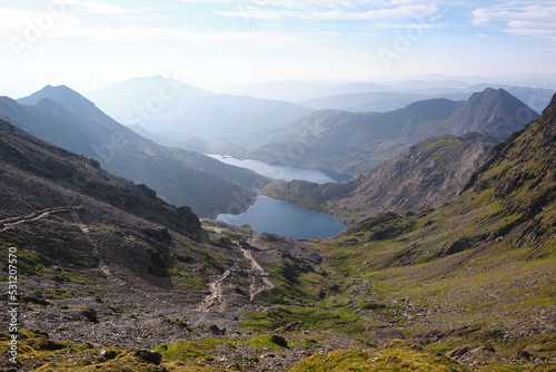 A photograph of Snowdon's valleys and lakes taken from the summit of Snowdon in June 2021