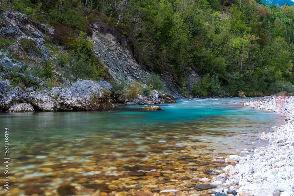 Colorful long exposure picture of emerald Soca (also known as Isonzo) River Valley at Julian Alps in Bovec, Slovenia	

