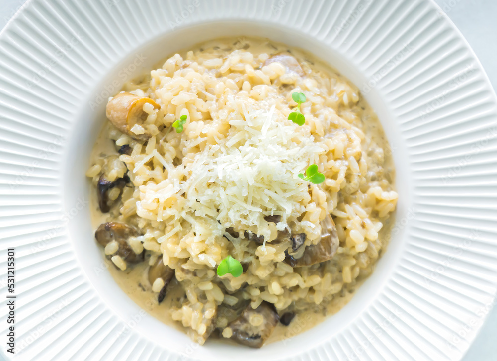 Delicious mushrooms risotto (boletus edulis) and cheese from Zamora, Spain Delicious mushrooms risotto (boletus edulis) and cheese from Zamora, Spain