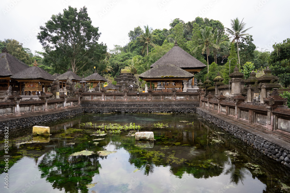 Balinese temple in the garden
authentic sculptures Balinese gods creature religion 
hindu faith
Bali Indonesia
religion of Bali
creatures god of Bali
holy place