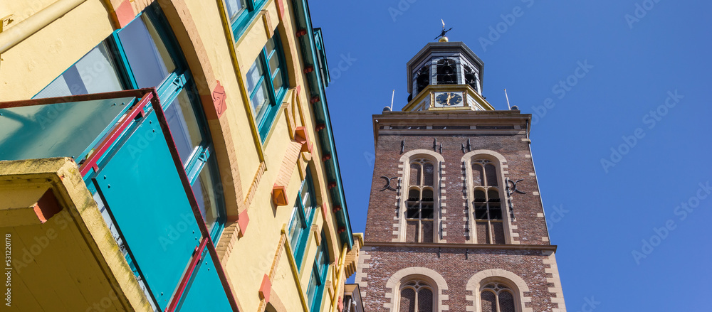 Panorama of a colorful house and belfry in Kampen, Netherlands - obrazy, fototapety, plakaty 