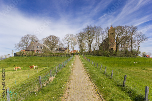 Path leading up to the historic church of Hegebeintum, Netherlands