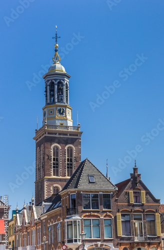 Old houses and historic tower in Kampen, Netherlands