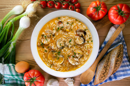 Rice soup with clams. Typical tapas recipe in a seaside town in Spain.