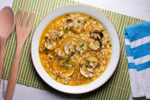 Rice soup with clams. Typical tapas recipe in a seaside town in Spain.