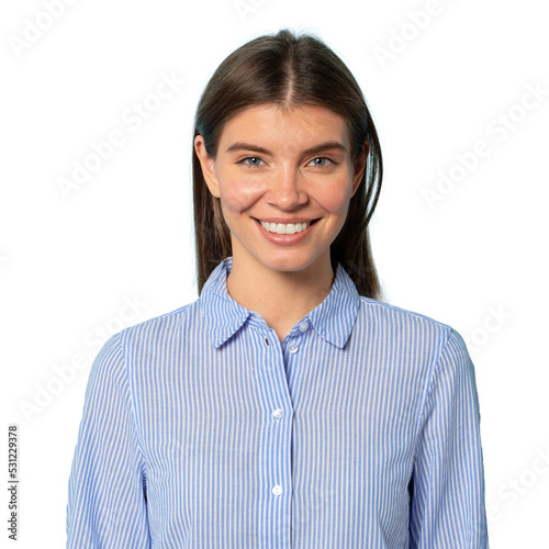 Half length portrait of happy girl in striped shirt looking at camera