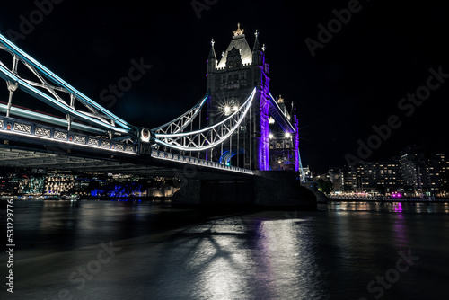 The Tower Bridge lit up in purple in the honour of Queen Elizabeth II photo