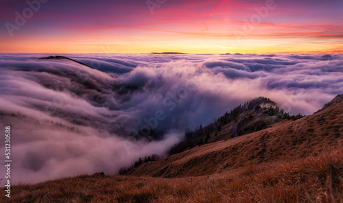 Morning sun panorama, beautiful fluffy clouds and forest at mount Suchy in Slovakia, Mala Fatra
