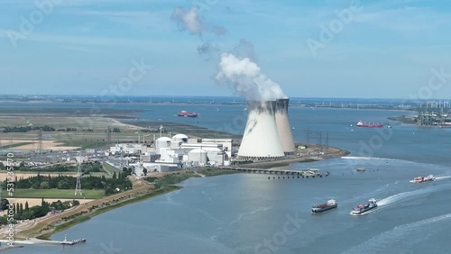 The Doel nuclear power plant, port of Antwerp. Belgium. Electric energy generation radioactive waste industrial reactor station facility. Aerial drone overview.Aerial drone panorama photo