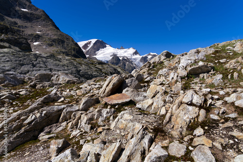 Beautiful scenic view of rock at Swiss mountain pass Susten on a sunny summer day. Photo taken July 13th, 2022, Susten Pass, Switzerland.