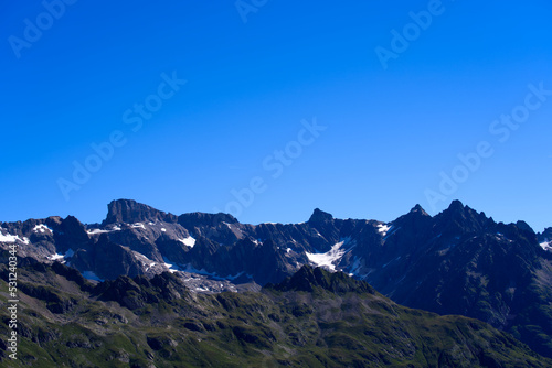 Beautiful mountain panorama at Swiss mountain pass Sustenpass with Meien Valley on a sunny summer day. Photo taken July 13th, 2022, Susten Pass, Switzerland.