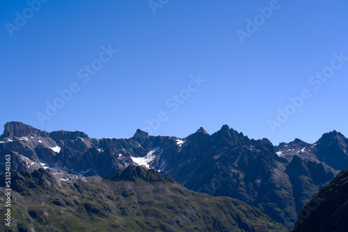 Beautiful mountain panorama at Swiss mountain pass Sustenpass with Meien Valley on a sunny summer day. Photo taken July 13th, 2022, Susten Pass, Switzerland.