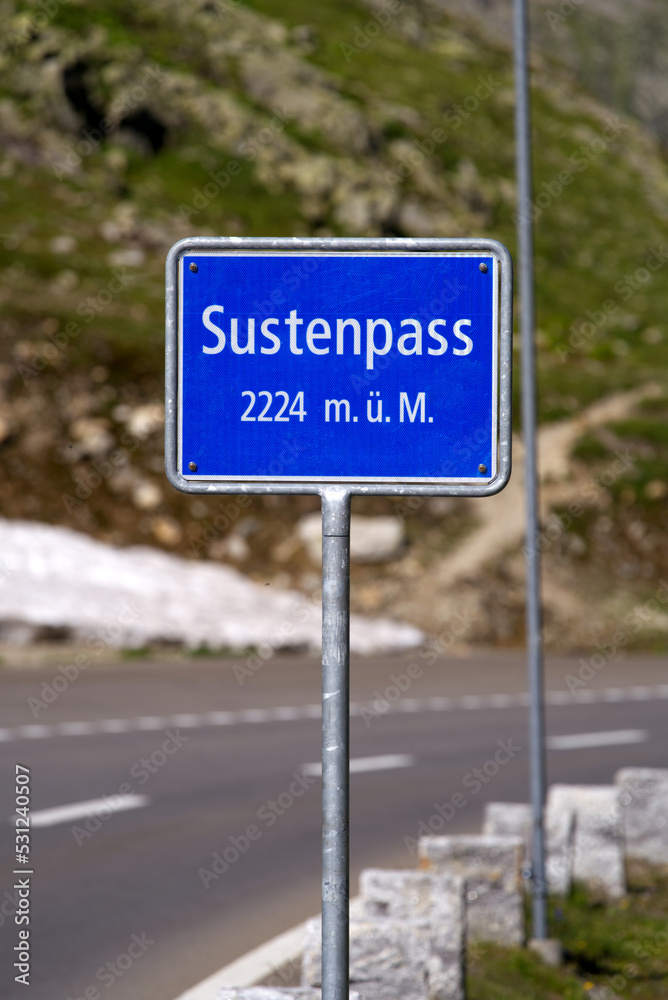 Road sign at Swiss mountain pass Sustenpass 2224 Meters above sea level on a sunny summer day. Photo taken July 13th, 2022, Susten Pass, Switzerland. Road sign at Swiss mountain pass Sustenpass 2224 Meters above sea level on a sunny summer day. Photo taken July 13th, 2022, Susten Pass, Switzerland.