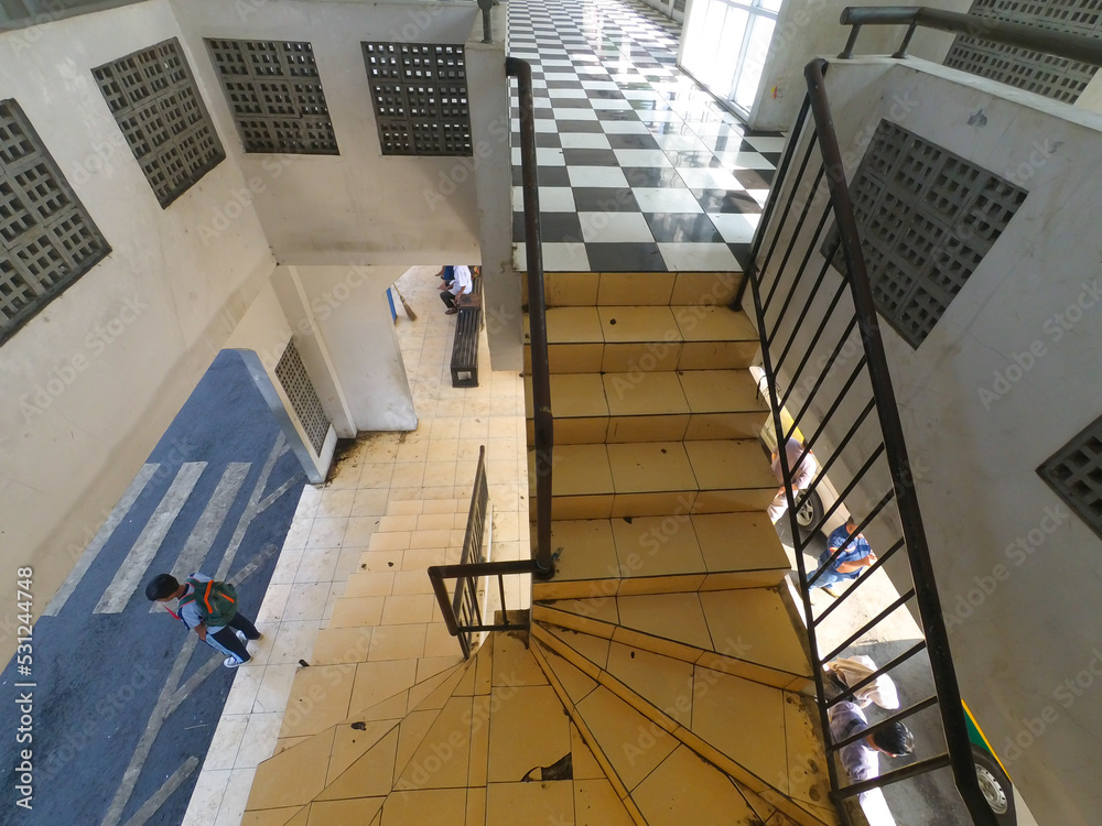 Fototapeta premium Photo of the staircase connecting the ground floor to the upper floor of a building in the town square of Cicalengka - Indonesia.