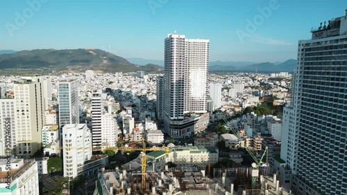 The town of Nha Trang standing on the seashore, drone view photo