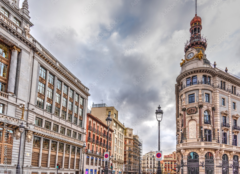 Luxury buildings in downtown Madrid on a cloudy day