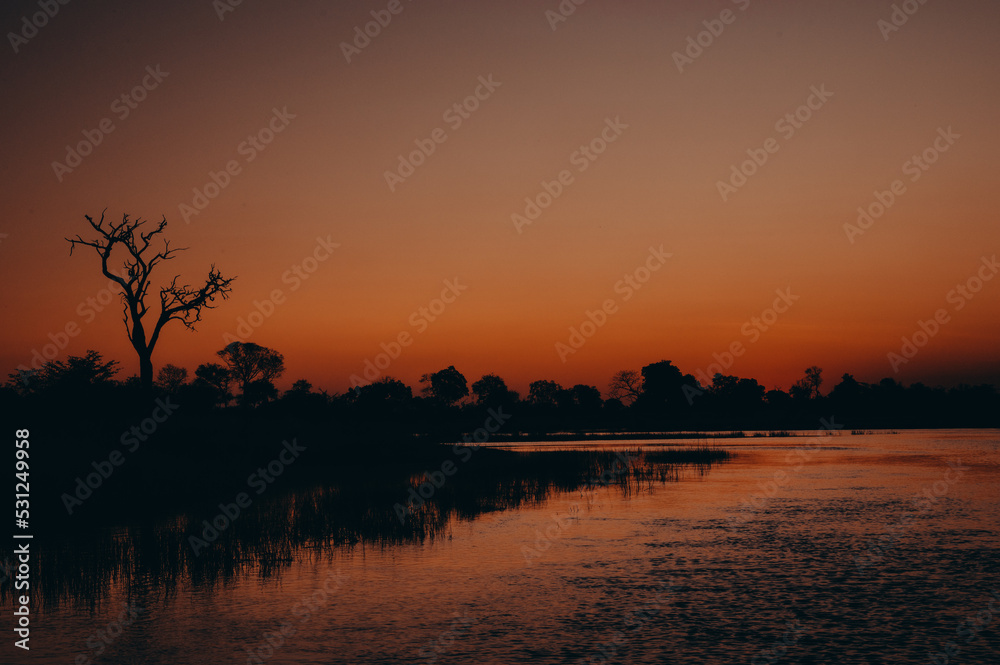 Stimmungsvolle Atmosphäre nach Sonnenuntergang auf dem Kwando (Caprivi, Namibia) Stimmungsvolle Atmosphäre nach Sonnenuntergang auf dem Kwando (Caprivi, Namibia)