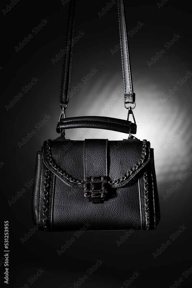 Black women's bag on a gradient background