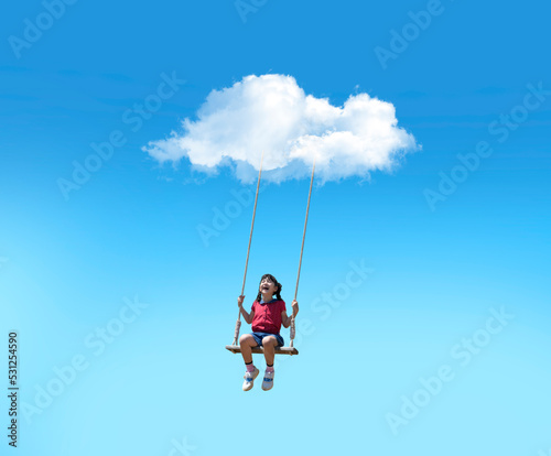 asian cute girl playing swing on the sky