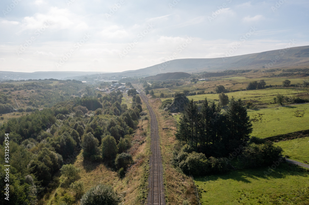 Obraz premium Aerial view above a Railroad Railway Track in South Wales
