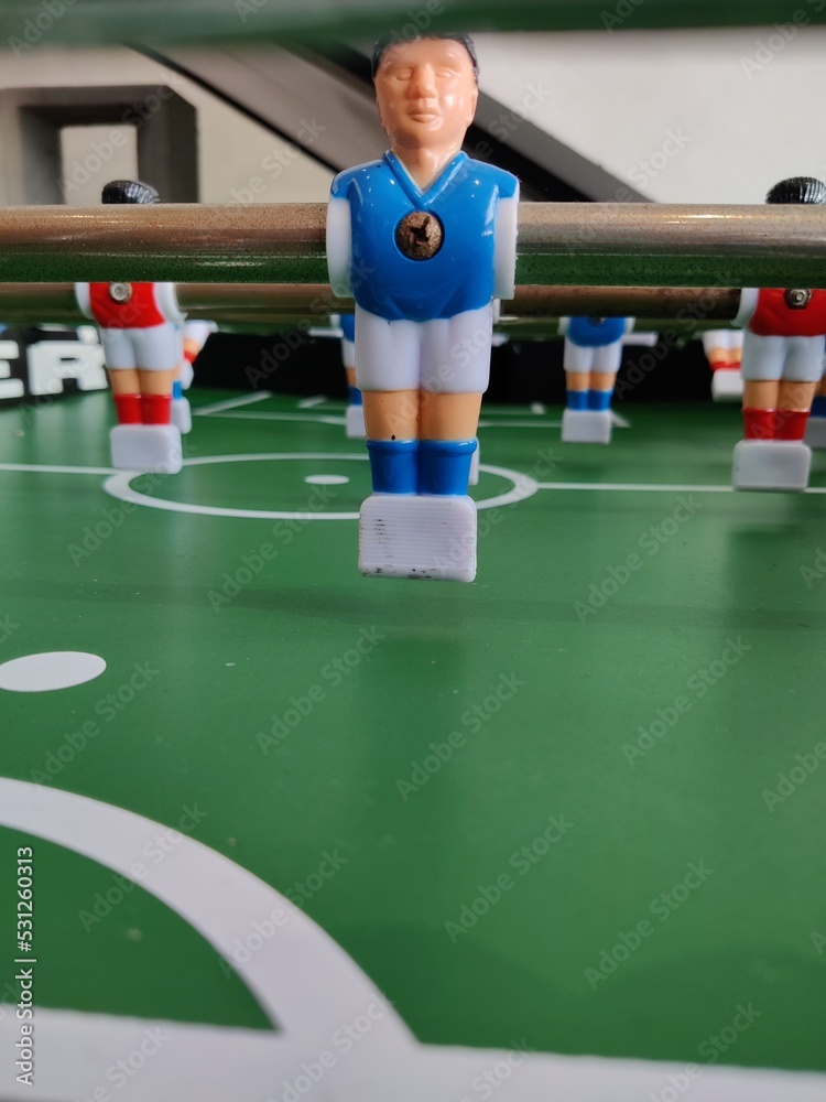 Arcade table soccer with tools for playing for office and home games. Arcade table soccer with tools for playing for office and home games.