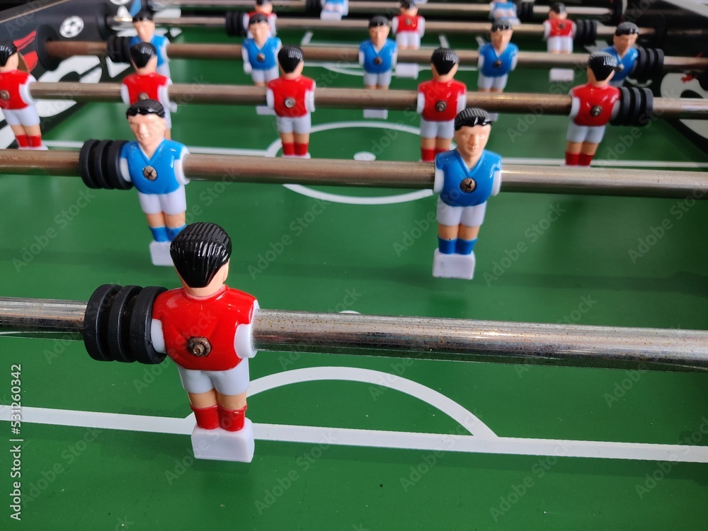 Arcade table soccer with tools for playing for office and home games. Arcade table soccer with tools for playing for office and home games.