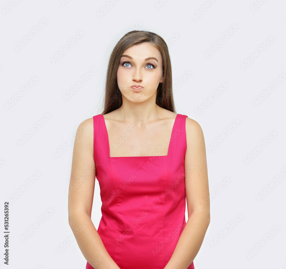 Portrait of displeased young girl .Disgust,disappointed girl looking at the camera. Portrait of displeased young girl .Disgust,disappointed girl looking at the camera.