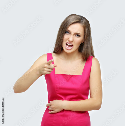 angry nervous girl screaming and pointing her finger