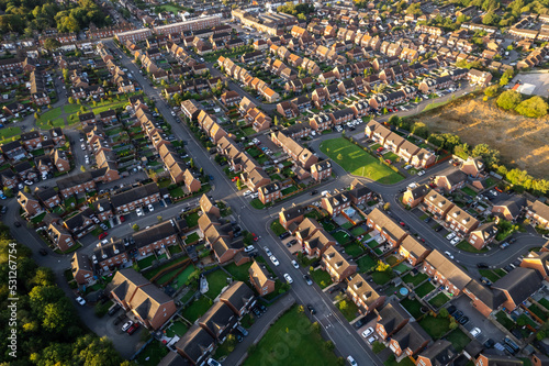 Top down aerial view of houses and streets in a residential area UK New Build Estate Agent House Prices 2022 photo