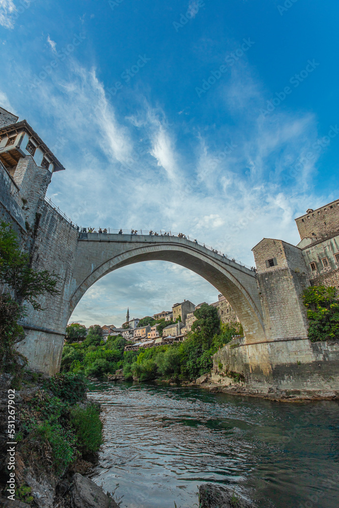 MOSTAR, BOSNIA AND HERZEGOVINA - JAugust  13, 2022: View of Stari most (Old Bridge) in Mostar. Bosnia and Herzegovina