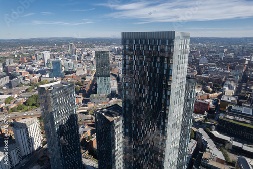 Fotografiet Manchester City Centre Drone Aerial View Above Building Work Skyline Construction Blue Sky Summer Beetham Tower Deansgate Square Glass Towers