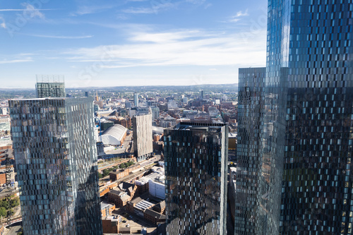 Print op canvas Manchester City Centre Drone Aerial View Above Building Work Skyline Construction Blue Sky Summer Beetham Tower Deansgate Square Glass Towers
