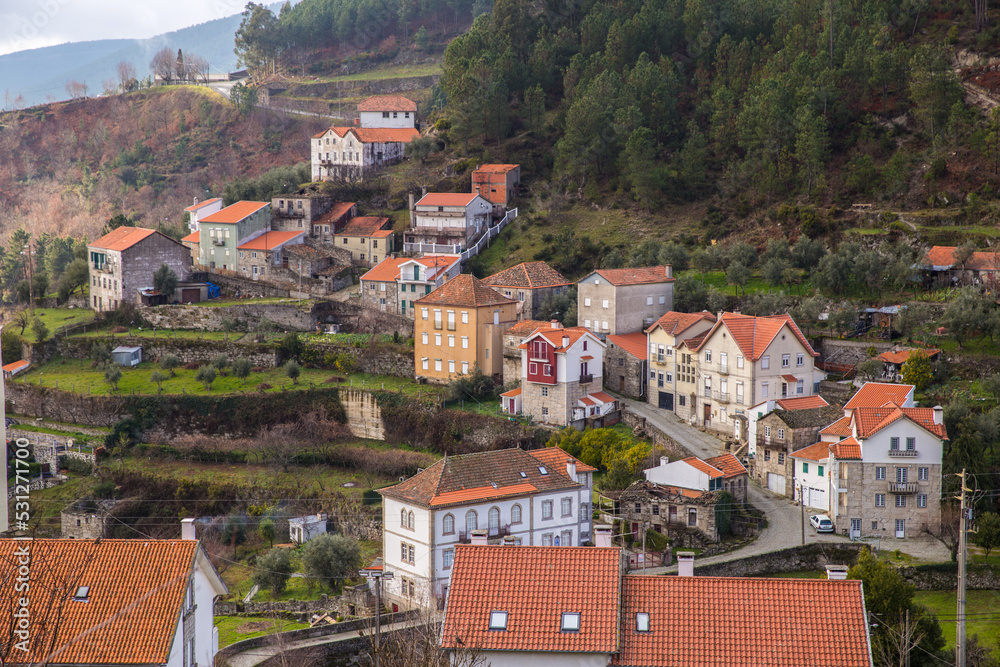 Rural village with houses built in the mountain, mountain region Portugal
